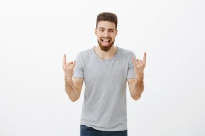 Carefree Caucasian Male Exuding Positive Vibes at Party – Free Stock Photo