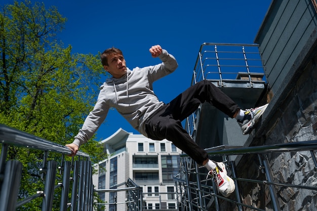 Full Shot Fit Man Practicing Parkour – Free Download