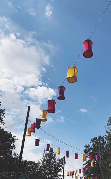 Low Angle View of Flags Hanging Against the Sky – Free Stock Photo for Download