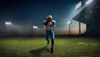 Professional American Football Player in Stadium – Free Download