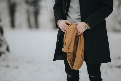 Stylish Man in Black Holding Brown Scarf – Free Download