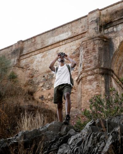 Low Angle Man with Binocular – Free Stock Photo for Download