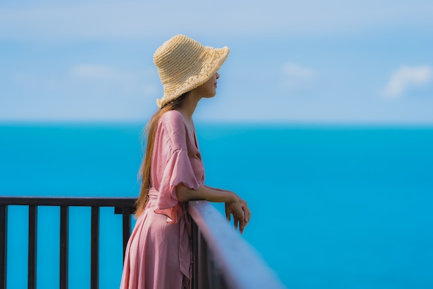 Beautiful Young Asian Woman Relaxing at the Beach – Free Stock Photo, Download Free