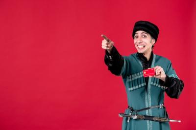 Portrait of an Azeri Man in Traditional Costume Holding a Credit Card – Free Download