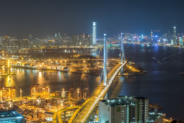 Stunning Hong Kong Nightscape with Bridge and Illuminated Buildings – Free Download