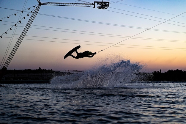 Wakeboard Jumping at Sunset – Free to Download Stock Photo