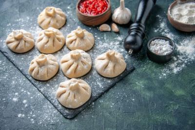 Raw Little Dumplings with Meat on Dark Surface – Free Stock Photo, Download for Free