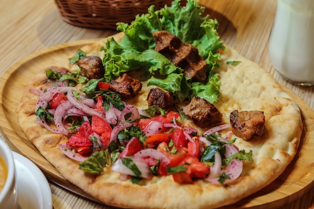 Side View Chicken Kebab with Onion, Tomato, and Herbs on Tandoor Bread – Free Download