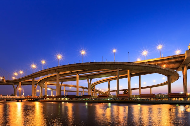 Curve of Expressway by River in Bangkok at Twilight – Free Download