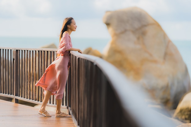 Beautiful Young Asian Woman Relaxing by the Sea Beach Ocean – Free Stock Photo, Download for Free