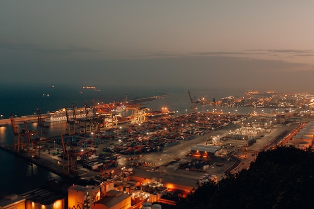 Distant Port Shot with Cargo Boats at Night – Free Download