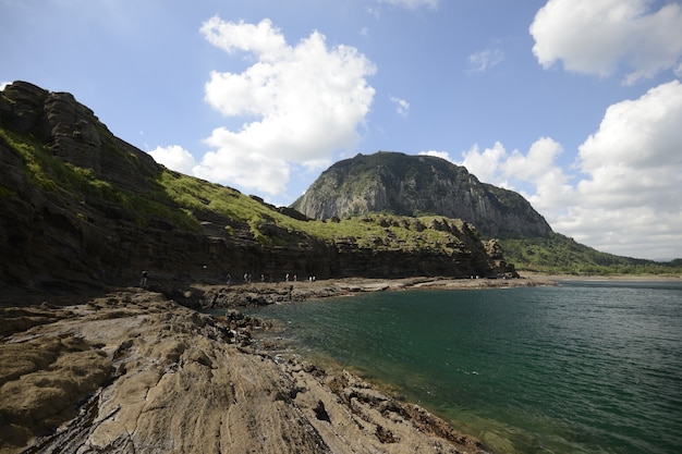 Stunning Rock Formations by the Coast in Jeju Island, South Korea – Free Download