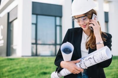 Smiling Builder Woman on Phone â Free Stock Photo, Download for Free