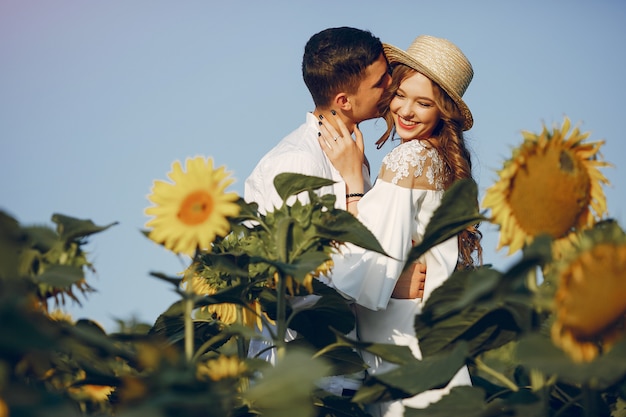 Beautiful Couple in a Sunflower Field – Free Download