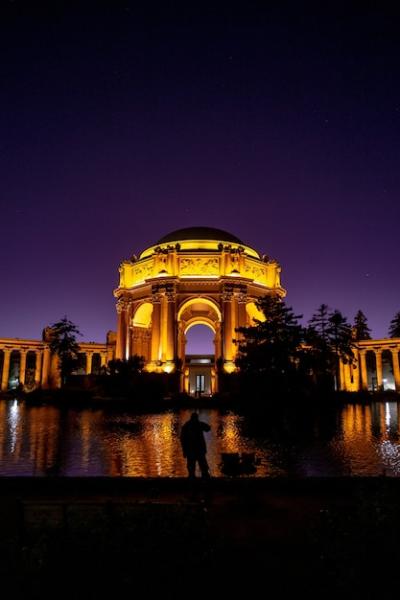 Nighttime Silhouette of a Person at a Monument – Free Stock Photo