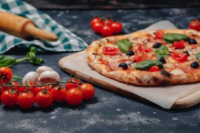 Delicious Neapolitan Pizza on a Board – Download Free Stock Photo