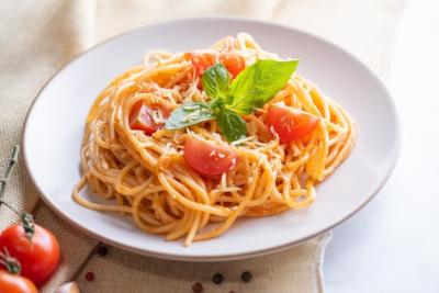 Classic Italian Spaghetti Pasta with Tomato Sauce, Parmesan, and Basil | Free Stock Photo for Download