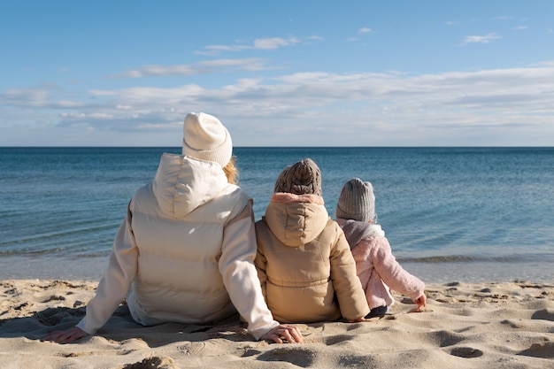 Mother and Kids Enjoying a Day at the Beach – Free Stock Photo for Download