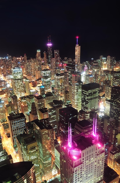 Nighttime Aerial View of Chicago’s Skyscrapers and City Skyline Overlooking Michigan Lakefront – Free Download