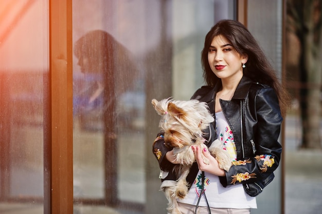 Brunette Gypsy Girl with Yorkshire Terrier Dog in Stylish Leather Jacket – Free to Download