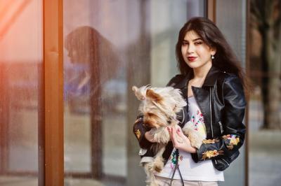 Brunette Gypsy Girl with Yorkshire Terrier Dog in Stylish Leather Jacket – Free to Download