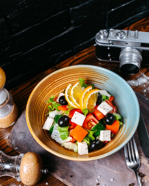 Vegetable Salad with Feta Cheese, Lemon Slices, and Black Olives – Free Stock Photo Download