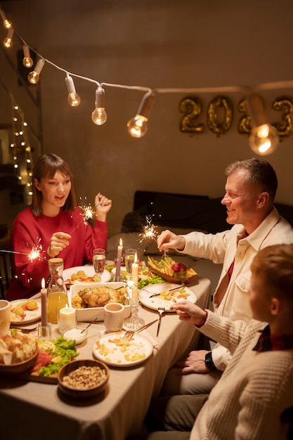 High Angle Family Sitting at Table – Free Stock Photo | Download for Free