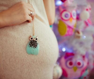 Little Toy Owl Resting on Woman’s Belly – Free Stock Photo, Download for Free