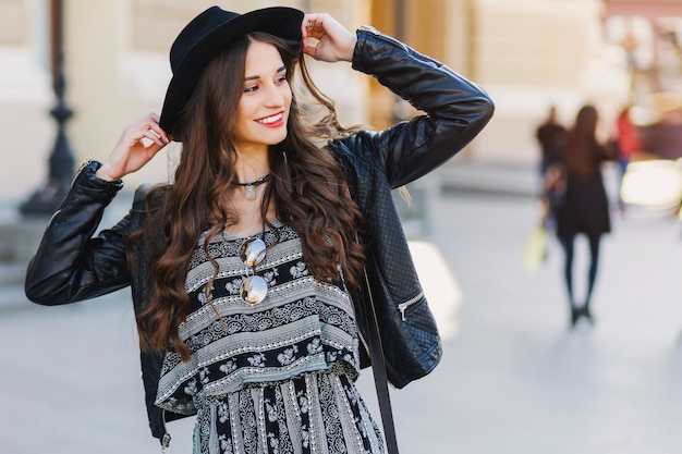 Brunette Woman in Trendy Urban Outfit: Street Fashion Photography for Free Download