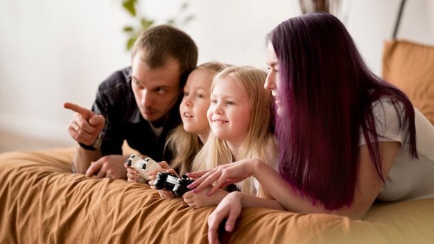 Parents Teaching Girls to Play with Joystick – Free Stock Photo, Download Free Stock Photo