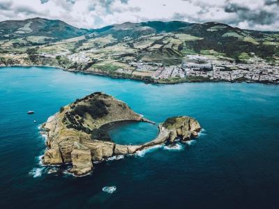 Stunning Aerial View of Sea and Mountains – Free Download