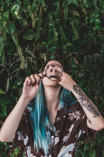 Funny Face Woman Through a Magnifying Glass – Free Stock Photo Download