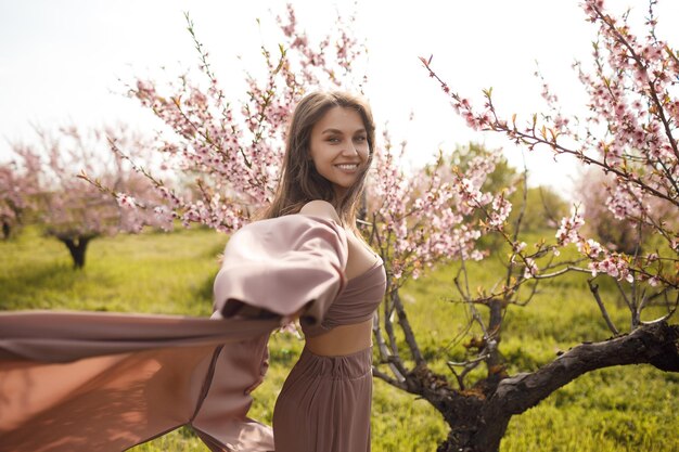 Portrait of a Young Pretty Woman in Bloom – Free Stock Photo for Download