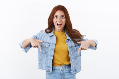 Enthusiastic Redhead Girl Expressing Astonishment – Free Stock Photo for Download