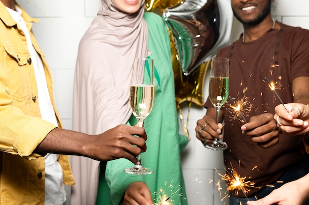 Close Up Colleagues Celebrating with Fireworks – Free Download