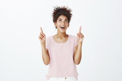 Happy Carefree Woman with Afro Hairstyle in Studio – Free Download