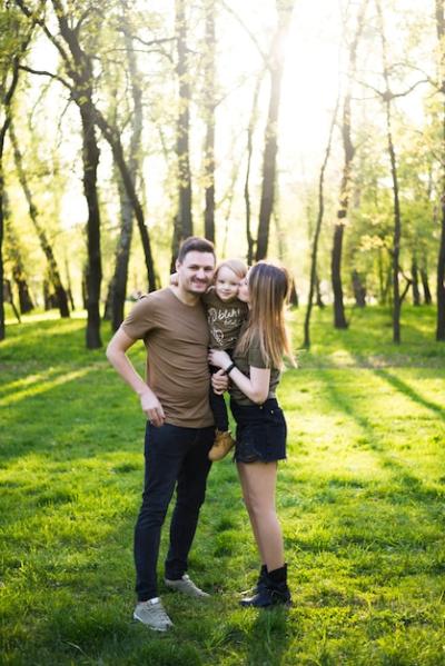 Happy Parents and Child Enjoying Nature – Free Stock Photo for Download