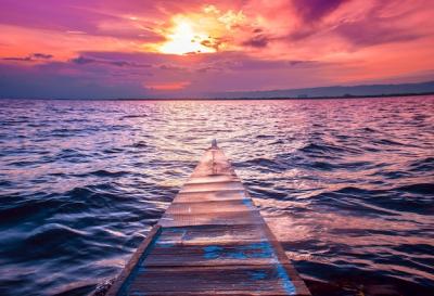 Small Boat Sailing in the Sea Under Stunning Red Sky – Free Stock Photo, Download Free