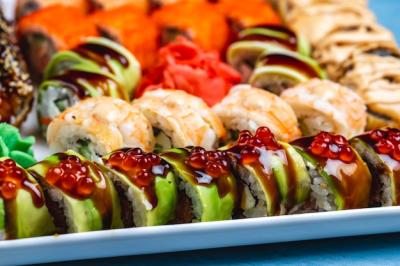 Sushi Set with Tiger Dragon Roll, Shrimp, Avocado, Teriyaki Sauce, and Ginger – Free Stock Photo for Download