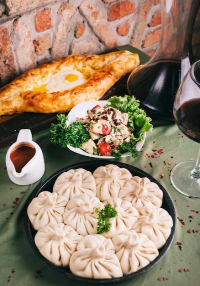 Georgian Khinkali Served with Salad Sauce and Tandir Bread – Free Download