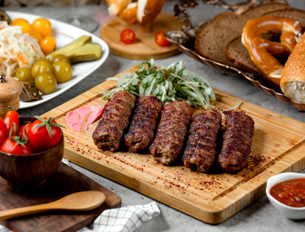 Lule Kebab with Onions and Pickles – Free Stock Photo, Download Free Stock Photo