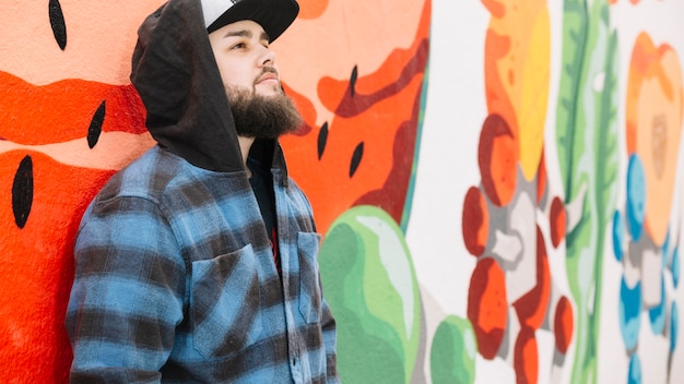 Beard Man Posing Against Vibrant Graffiti Wall – Free Download