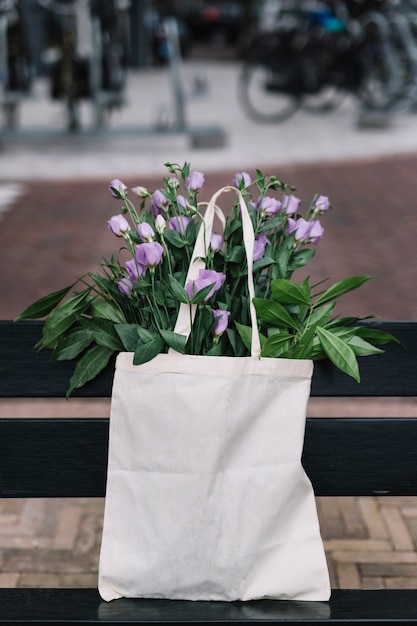 White Cotton Handbag Enhanced by Beautiful Purple Eustoma Flowers – Free Download