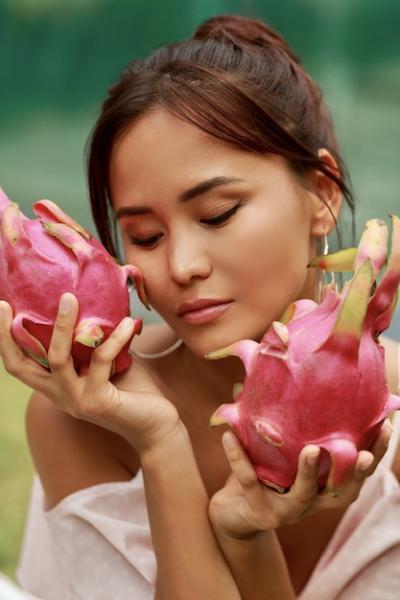 Beauty Portrait of Asian Woman with Dragon Fruit – Free Download