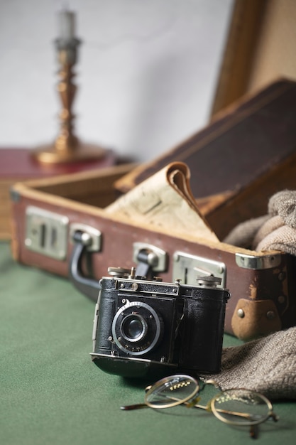 Vintage Camera with Briefcase and Books – Free Download