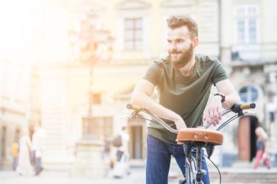 Male Cyclist with Bicycle Looking Away – Free Stock Photo for Download