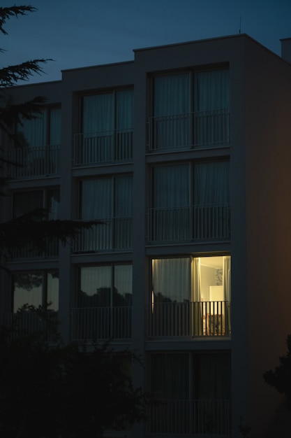 Modern White Building with Balcony Windows – Free Stock Photo for Download