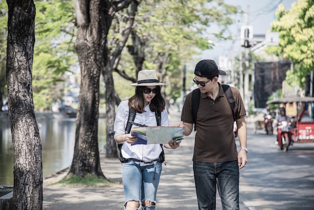 Asiancouple Tourist Navigating City Streets – Free Stock Photo, Download for Free