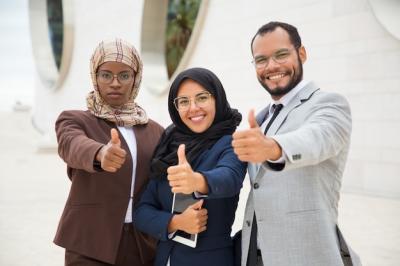 Multicultural Business Group Gesturing Together – Free Stock Photo for Download