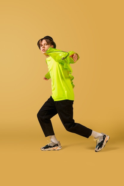 Old-School Fashioned Young Man Dancing in Yellow Studio – Free Stock Photo, Download Free